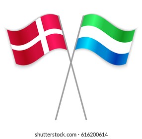 Danish and Sierra Leonean crossed flags. Denmark combined with Sierra Leone isolated on white. Language learning, international business or travel concept.