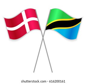 Danish and Tanzanian crossed flags. Denmark combined with Tanzania isolated on white. Language learning, international business or travel concept.