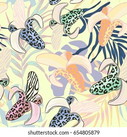 
Daring, wild, evocative, bright, memorable, fashionable, trendy, vector pattern seamless with leopard bananas and pineapples and other tropical plants.