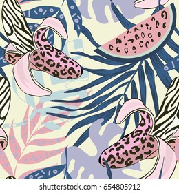 
Daring, wild, evocative, bright, memorable, fashionable, trendy, vector pattern seamless with leopard bananas and pineapples and other tropical plants.