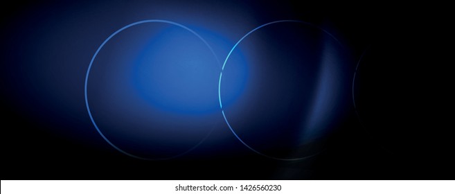 Dark abstract background with bright color neon lights and lines. Glowing background, vector futuristic techno template