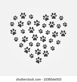 Dark animal's footprints in heart shape vector illustration or symbol