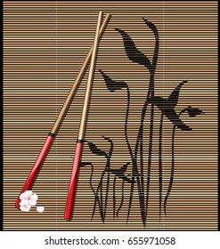 dark background, abstract image of straw mat and red chopsticks for sushi with pink flowers