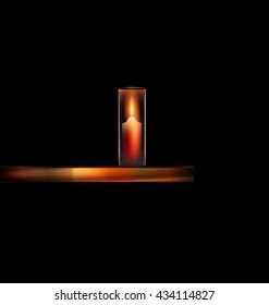 dark background and burning candle on the wooden stand