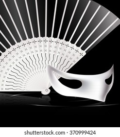 dark background and carnival white halfmask with fan