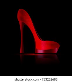 dark background and the ladys red shoe