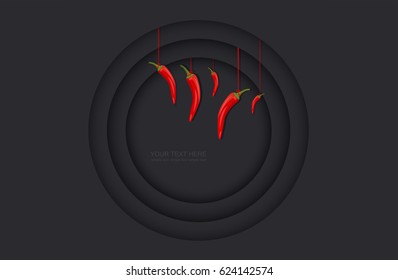 Dark background with red chili peppers