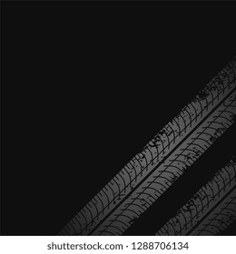 dark background with tire print marks