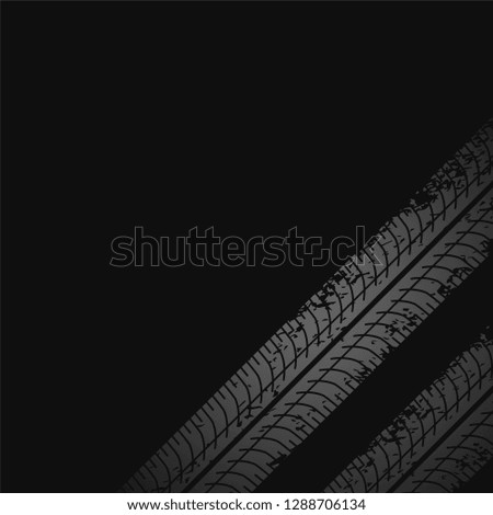 dark background with tire print marks