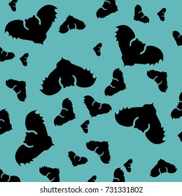 dark bats on a blue background.