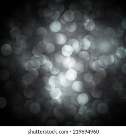 Dark black Defocused Light, Flickering Lights, Vector abstract festive background with bokeh defocused lights.