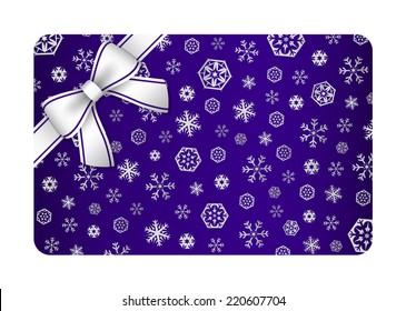 Dark blue Christmas card with silver snow flakes and ribbon in the corner