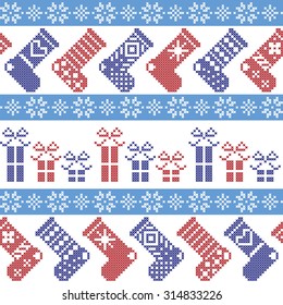 Dark blue, light blue and red Nordic Christmas pattern with stockings, stars, snowflakes, presents, decorative ornaments in scandinavian cross knitted cross stitch 

