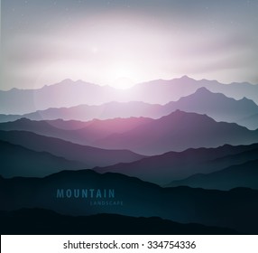dark blue mountain landscape with fog and a sunrise and sunset