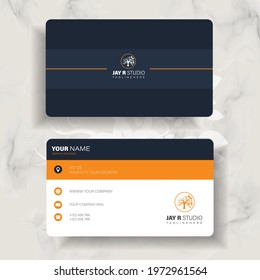 dark blue and orange modern business card 