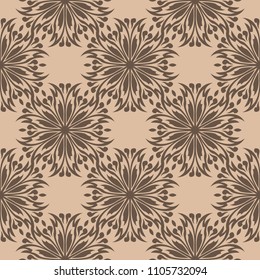 Dark brown floral ornament on beige background. Seamless pattern for textile and wallpapers
