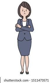 A dark brown haired woman in a gray suit is angry with her arms crossed.