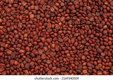 dark brown roast coffee beans background