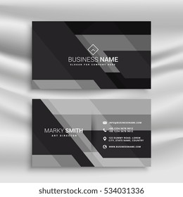 dark business card design with abstract shapes