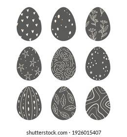 Dark, chocolate Easter eggs decorated with simple ornamentation. Spring holiday. Flat design, vector illustration