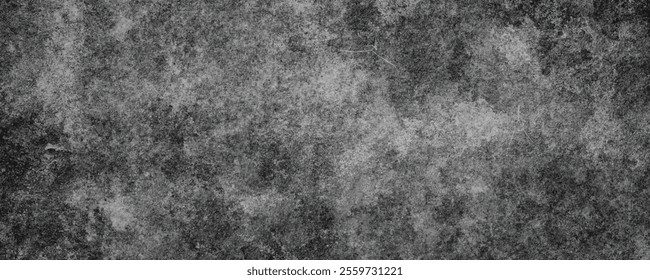 Dark and dramatic grunge concrete wall featuring cloudy grey patterns, scratches, and faded stains.
