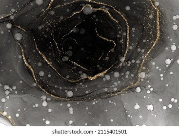 Dark elegant hand painted alcohol ink background with gold glitter 