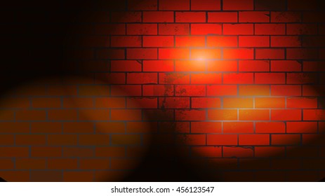 The dark floodlit wall