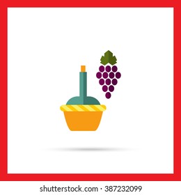 Dark grape bunch with wine bottle