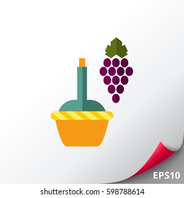 Dark grape bunch with wine bottle