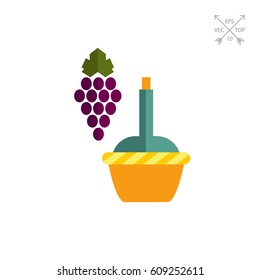 Dark grape bunch with wine bottle