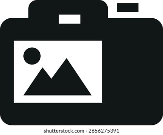 Una silueta gris oscura de una cámara digital muestra una Pequeña Imagen paisajística en su pantalla, con montañas y un sol.