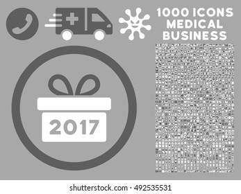 Dark Gray And White Gift 2017 Year vector bicolor rounded icon. Image style is a flat icon symbol inside a circle, silver background. Bonus clip art includes 1000 medicine business design elements.