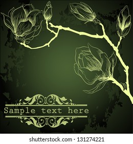 Dark green background and magnolia flowers