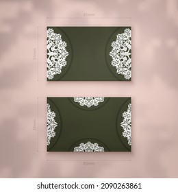 Dark green business card with Greek white pattern for your business.