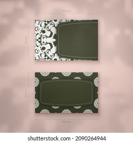 Dark green business card with Indian white ornaments for your brand.