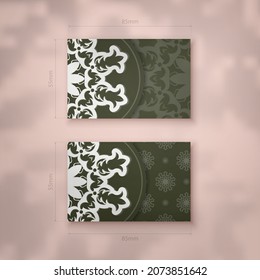 Dark green business card with vintage white pattern for your personality.