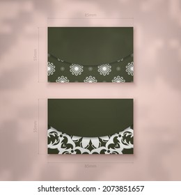 Dark green business card with vintage white pattern for your personality.