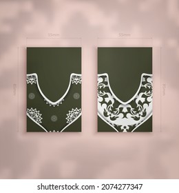 Dark green business card with vintage white pattern for your business.