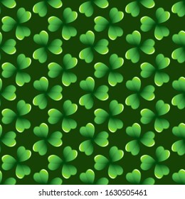 Dark green clover leaves vector seamless pattern. Nature spring background. Irish traditional St. Patrick's day design element.