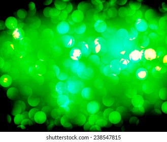 dark green Defocused Light, Flickering Lights, Vector abstract festive background with bokeh defocused lights. 