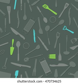 Dark grey background decorated with kitchen tools