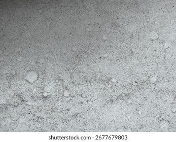 Dark grey textured concrete wall background