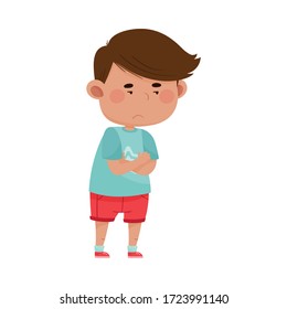 Dark Haired Boy Wearing Red Shorts Folding His Arms on the Chest Showing Dissatisfied Expression on His Face Vector Illustration