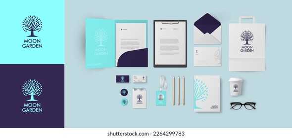 Dark and light blue logo with tree in corporate identity for beauty or fashion company, stationery mockup set with folder and business card can be used as template for firm style