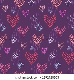 Dark magenta seamless pattern with pink hearts and blue dotted elements on purple background. Lovely scandinavian texture with doodle heart shapes for St. Valentines wrapping paper, surface, textile