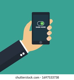 dark mode concept - mobile phone on bussines hand and dark mode switch.Conceptual vector illustration in flat style design.Isolated on background.