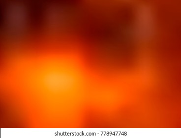 Dark Orange vector blurred background. Shining colored illustration in a brand-new style. Brand-new style for your business design.