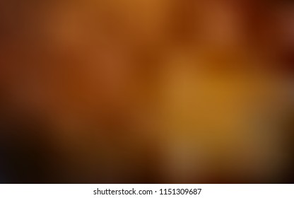 Dark Orange vector blurred bright texture. A vague abstract illustration with gradient. The textured pattern can be used for background.