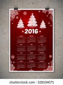 Dark Red 2016 New Year Calendar With White Paper Christmas Trees And Snowflakes, Poster Template At Concrete Wall Background