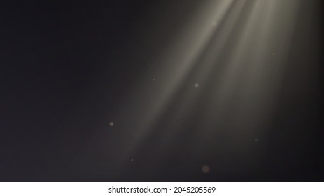 Dark room with golden rays of light or sunlight